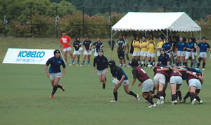 A match in full flow at the Kobelco Cup First High School Girls Rugby Sevens Tournament