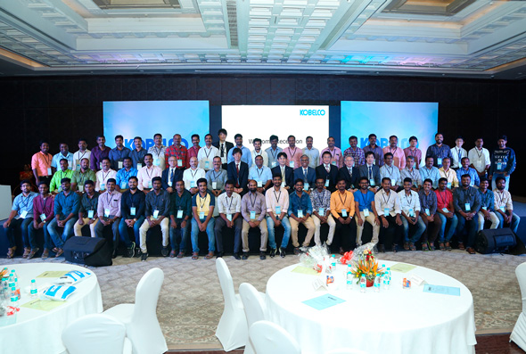 Group photo of reception celebrating transition to the new company