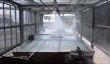 Water spraying at crushing facility