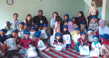 Visiting and giving donations at a children's facility