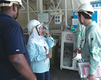 Checking chemical tanks (Malaysia)