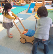 Children playing with wooden toys (Inabe)