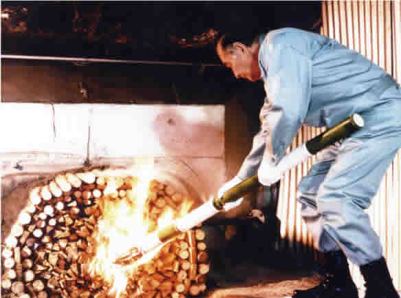 Then-president Sokichi Kametaka firing the No. 3 Blast Furnace at the Kobe Works