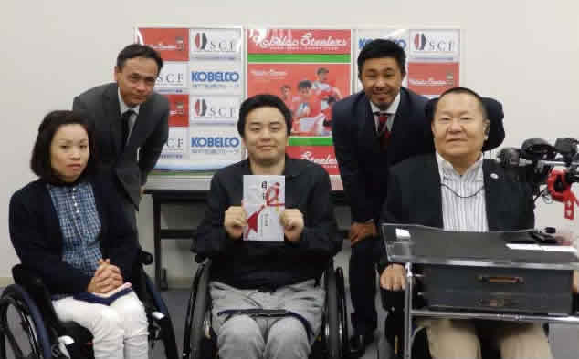 Together with members from the Japan Spinal Cord Foundation