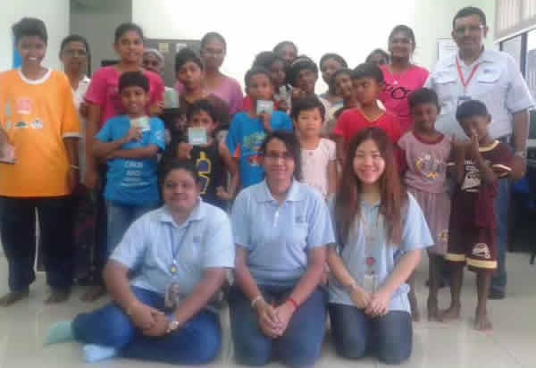 Visiting children in an orphanage